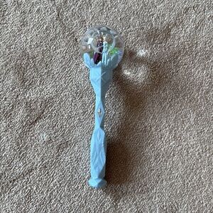 Frozen fans. White Geometric Handle Snow Globe. Plays music. EUC.